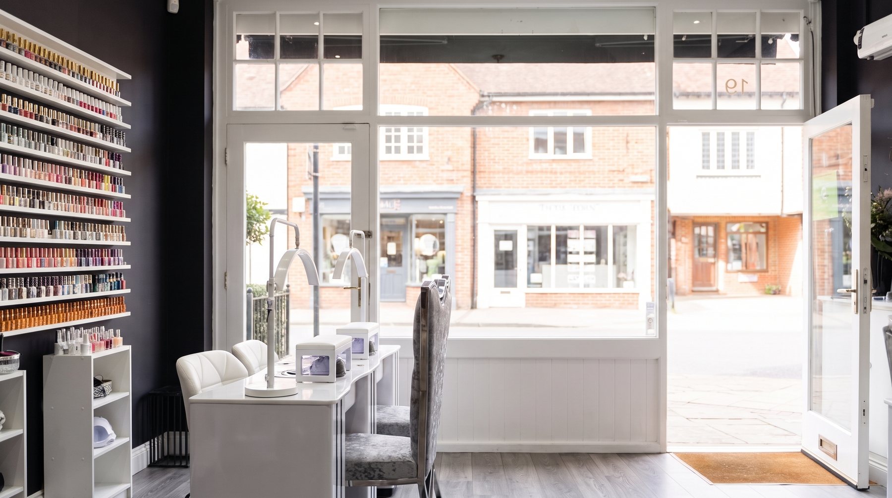 Looking out through the shop window to Station Approach